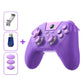 Purple tri-mode game controller with analog sticks, ABXY buttons, and included stand/receiver
