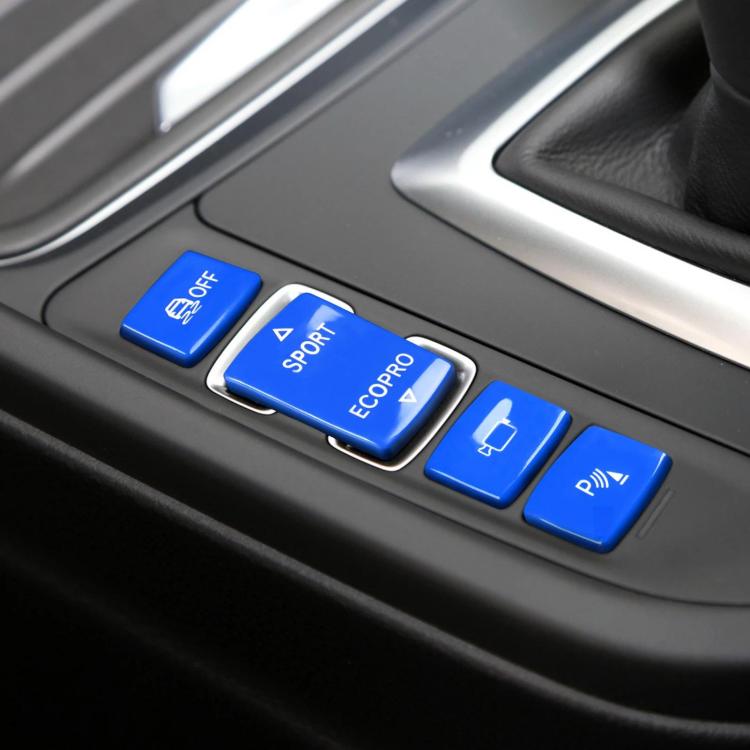 Car gear shift switch buttons set with blue caps and white icons on center console