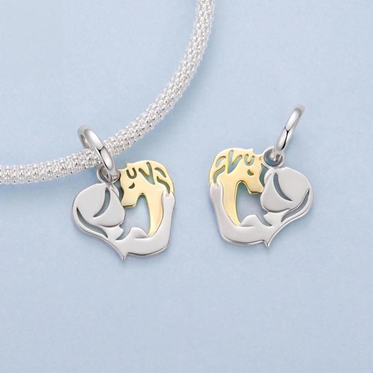 Heart-shaped animal charms on a silver chain, two-tone silver and gold accents