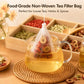 Hanging white non-woven tea filter bag filled with herbs