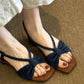 Dark blue open-toe slingback sandals with knotted strap and mid block heel