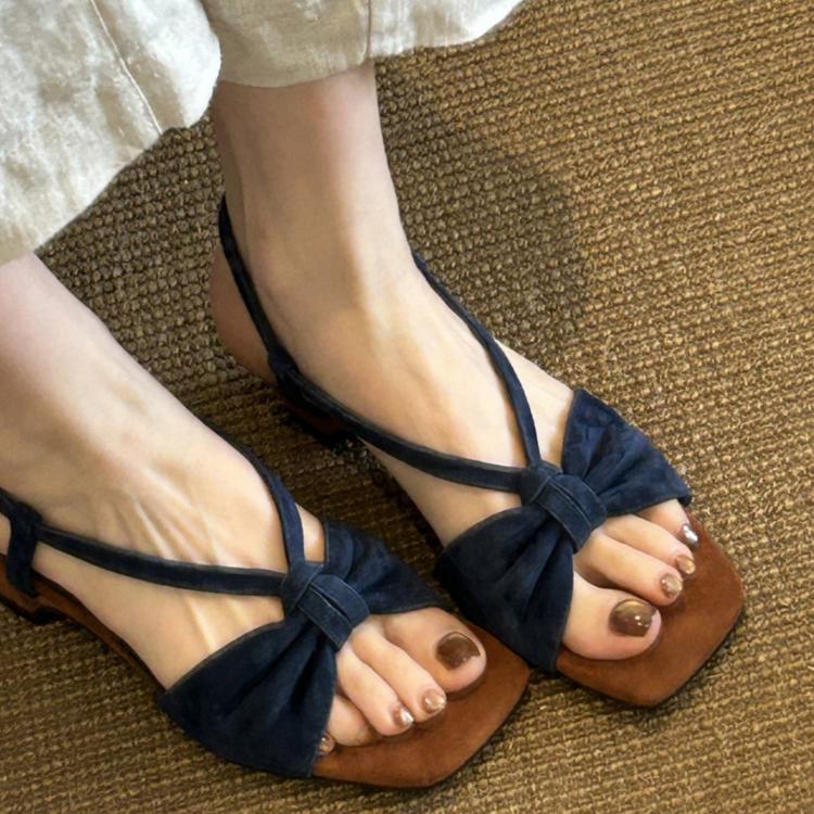 Dark blue open-toe slingback sandals with knotted strap and mid block heel