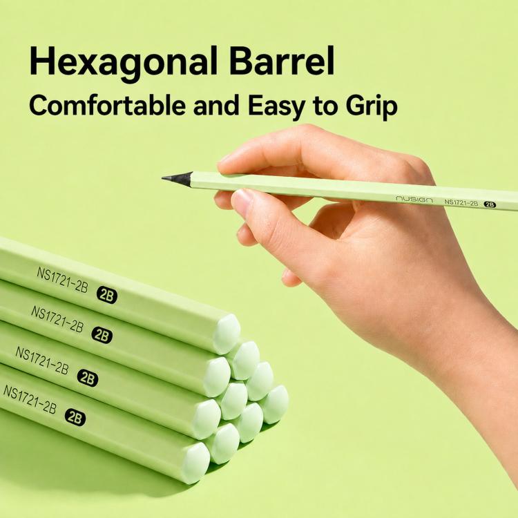 Hand holding 2B green pencils with hexagonal barrels for easy grip.