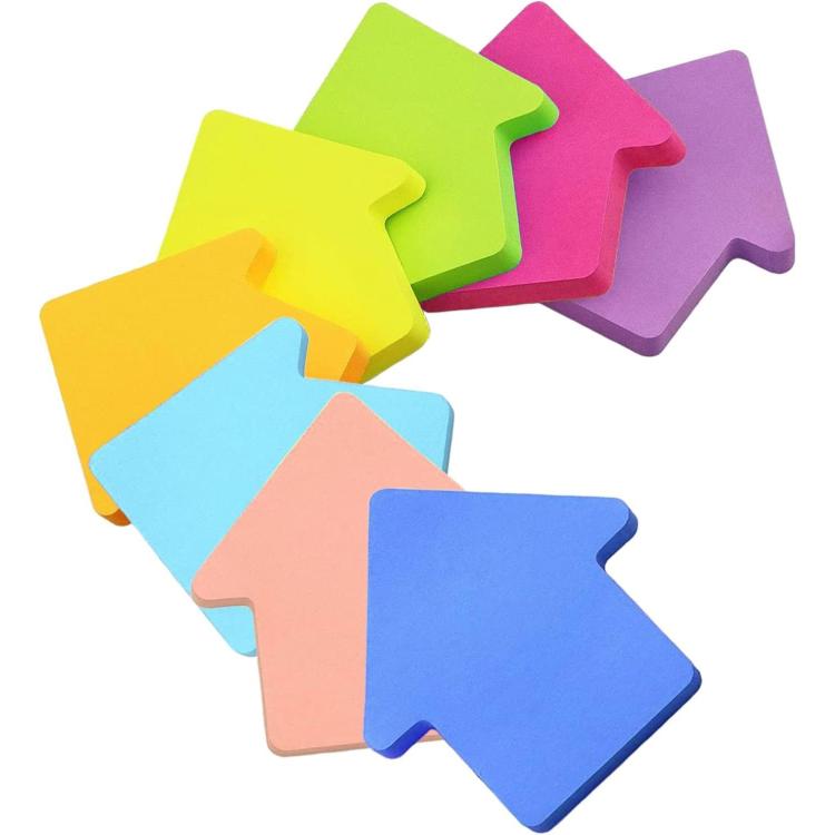Arrow-shaped sticky memo notes in assorted bright colors, layered in a pile.