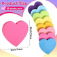 Heart-shaped sticky notes in pink and multicolor stacks for memo writing