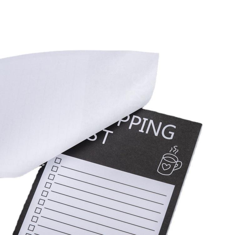 Shopping list pad with 'SHOPPING' title and heart icon on black cover