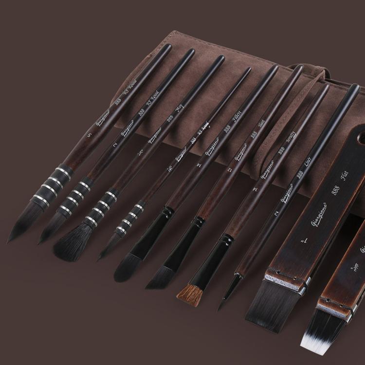 Set of watercolor brushes with wooden handles and varied synthetic bristle shapes