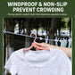 Elastic clothesline holding a shirt with pink and white non-slip clips