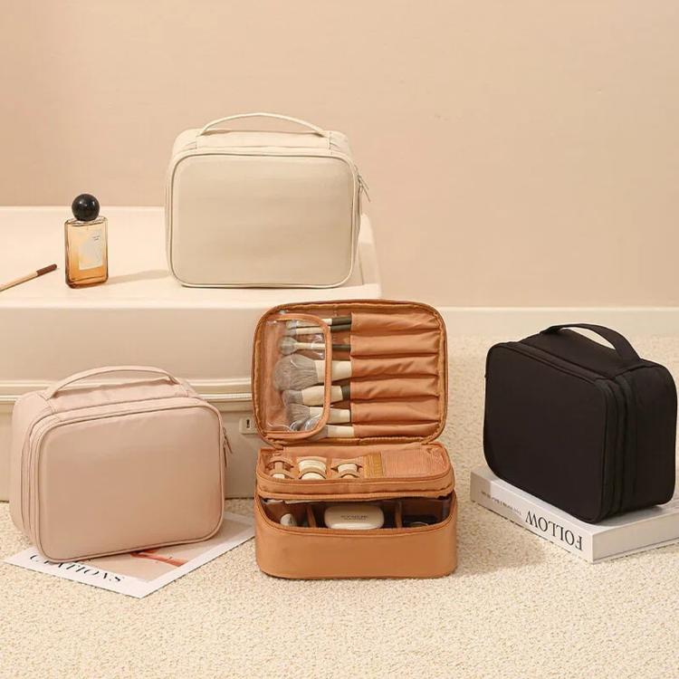 Set of makeup bags organizer: beige, tan, and black zip-top cases with carry handles