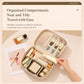 Beige travel makeup bag with adjustable dividers and brush holder slots, open view