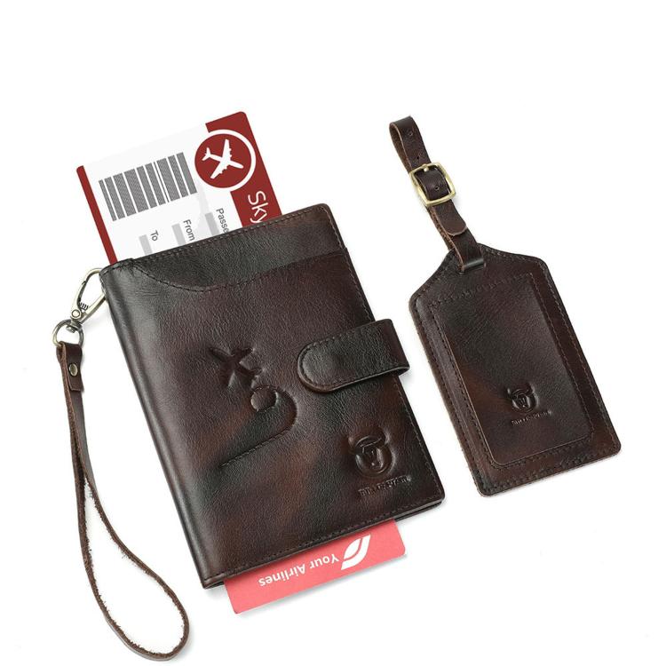 Brown leather passport holder with luggage tag, embossed aircraft emblem, wrist strap