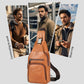 Tan leather crossbody sling bag with front zip pocket and adjustable strap