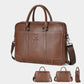Brown leather briefcase with top handles and front pocket, shown with matching strap