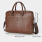 Brown leather briefcase front view with top handles and side crossbody strap