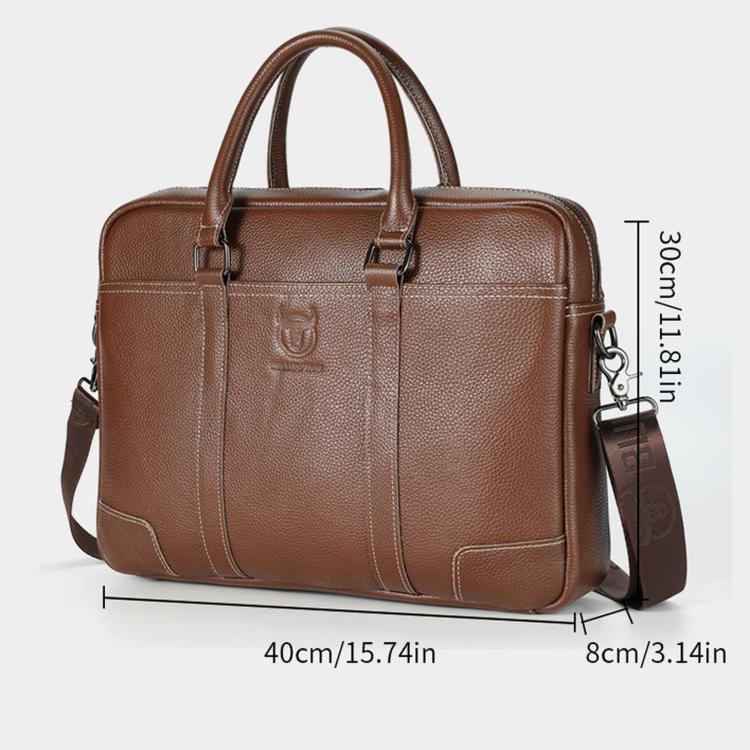 Brown leather briefcase front view with top handles and side crossbody strap