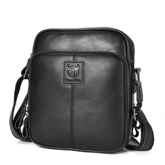 Men's black leather crossbody bag with zip top and front logo patch.