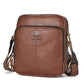 Men's brown leather crossbody bag with zip top and front logo patch.