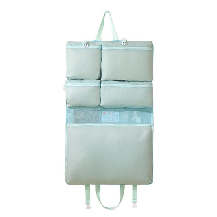 Hanging travel clothes organizer bag, light blue with multiple padded compartments and hanging straps