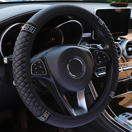 Quilted leather steering wheel cover with rhinestone trim, black