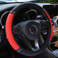Quilted leather steering wheel cover with rhinestone trim, red