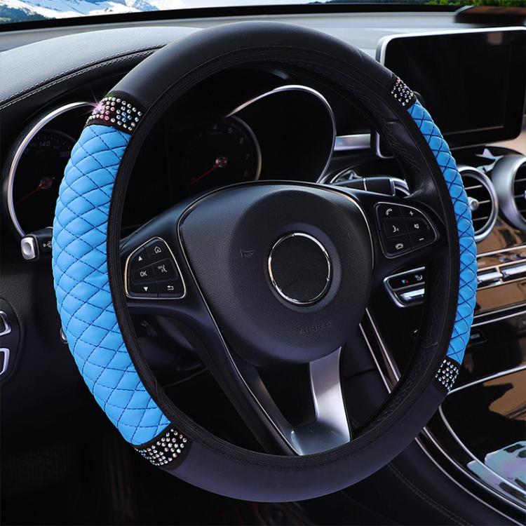 Quilted leather steering wheel cover with rhinestone trim, blue