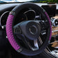 Quilted leather steering wheel cover with rhinestone trim, purple