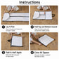 White foldable garment bag with zip closures and carry handles, folded flat