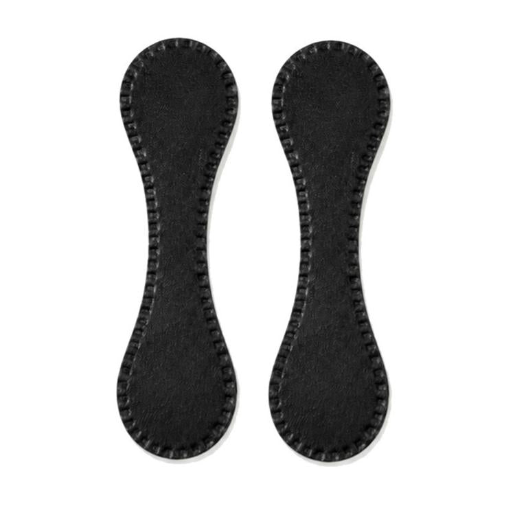 Pair of black leather-style magnetic hem clips with stitched teardrop shape