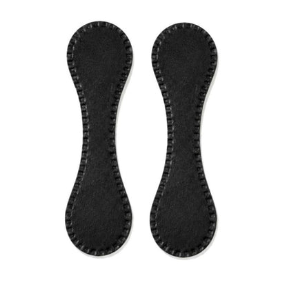 Pair of black leather-style magnetic hem clips with stitched teardrop shape