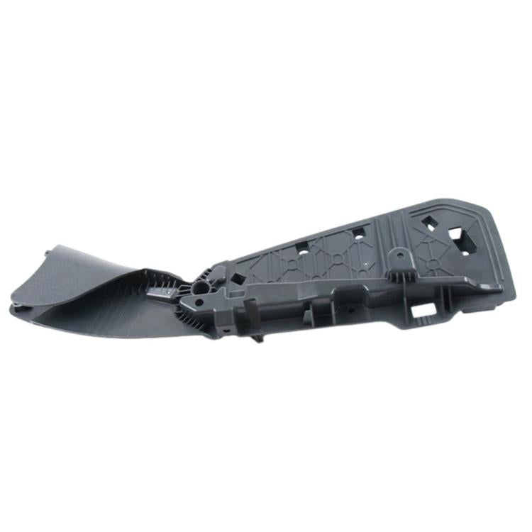Black car seat side bracket cover panel, angled view showing molded sections