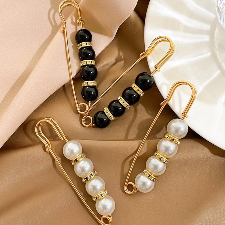 Mixed black and white pearl safety pin waist tightener clips with gold-tone details