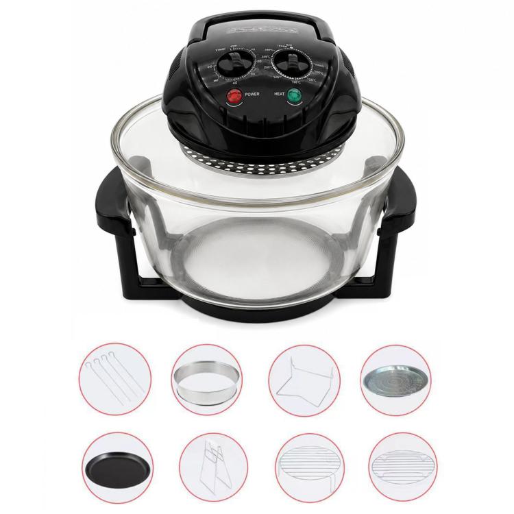 Black countertop air fryer with clear glass bowl and accessory parts shown