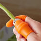 Close-up of orange anti-cut finger sleeve on thumb knife cutter handle