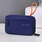 Navy blue rectangular toiletry bag with orange handle loop and zip closure