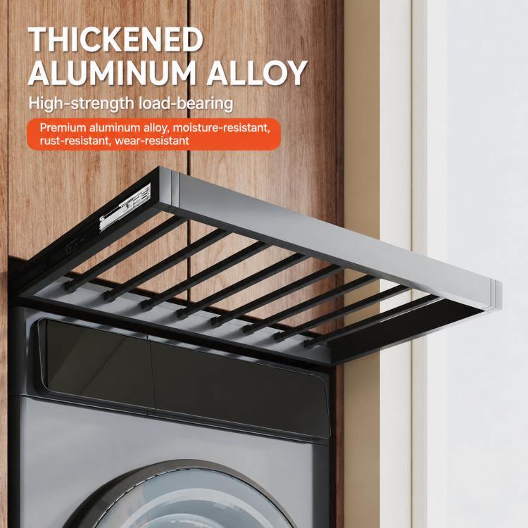 Gray pull-out laundry drying rack with slatted rods above a washer, extended from the cabinet