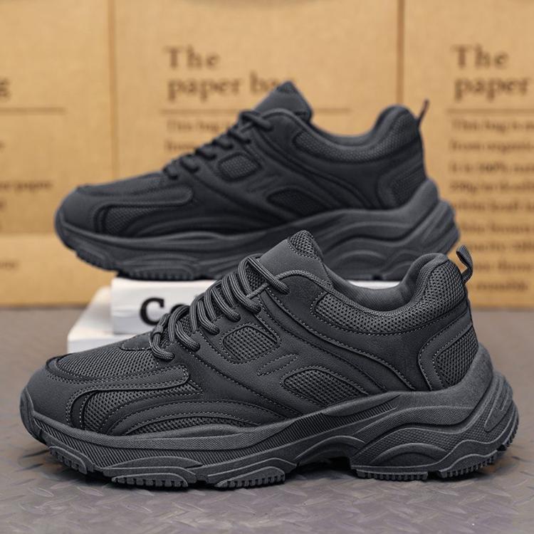 Men's grey lace-up running sneakers, low-top style with textured upper and tread sole