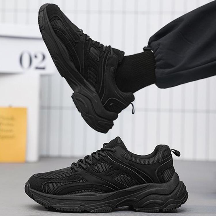 Men's black lace-up sneakers with cushioned collar and rugged tread sole