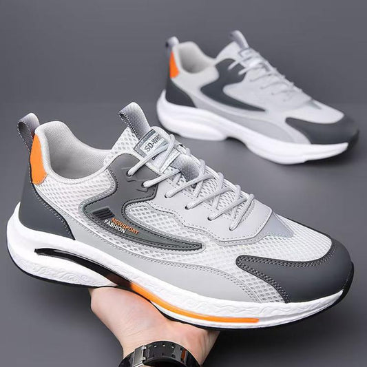 White and gray mesh sports sneakers with lace-up closure and cushioned athletic sole