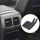 Black AC vent grille paddle insert, angled view with two side mounting prongs