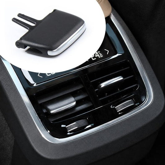 Black air vent paddle shifter insert, mounted in center dashboard vent