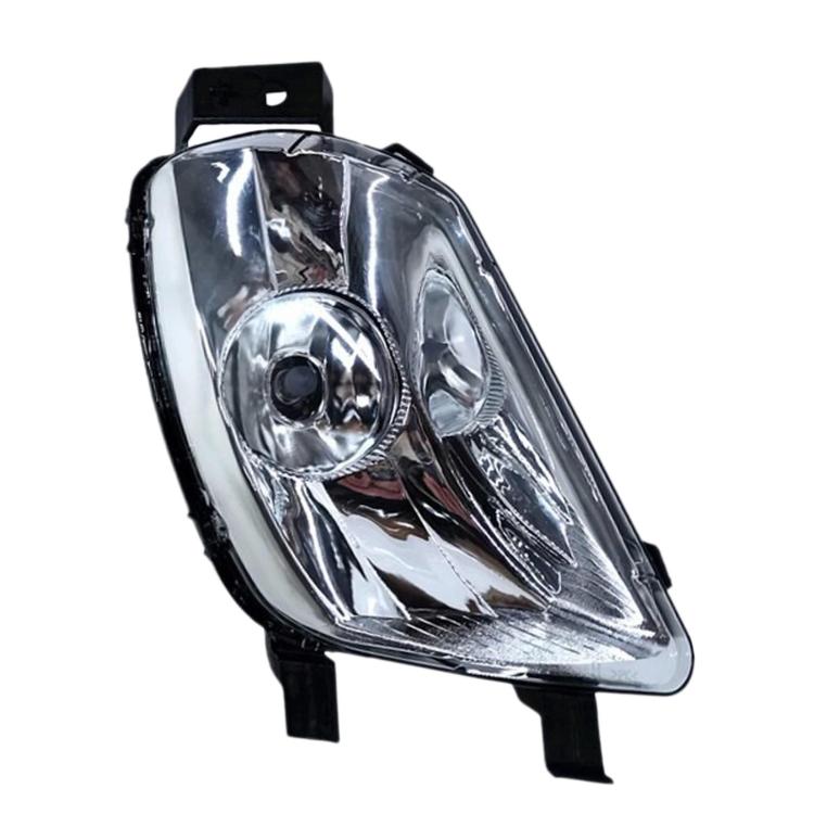 Front fog light assembly with circular reflector, clear lens, and black housing