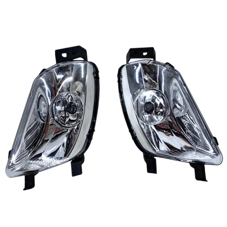 Pair of front fog light assemblies with clear projector-style lenses and black housings