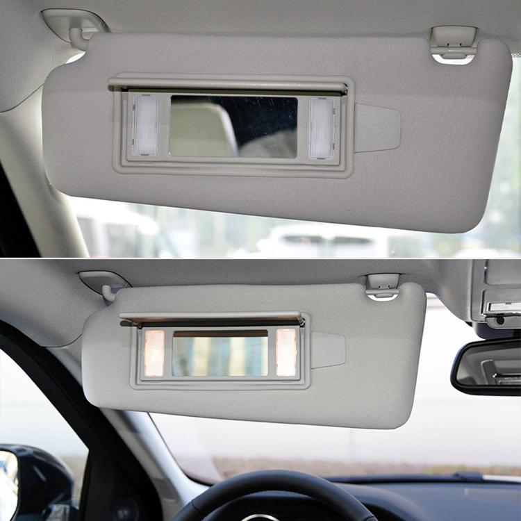 Light gray sun visor vanity mirror cover with illuminated mirror window