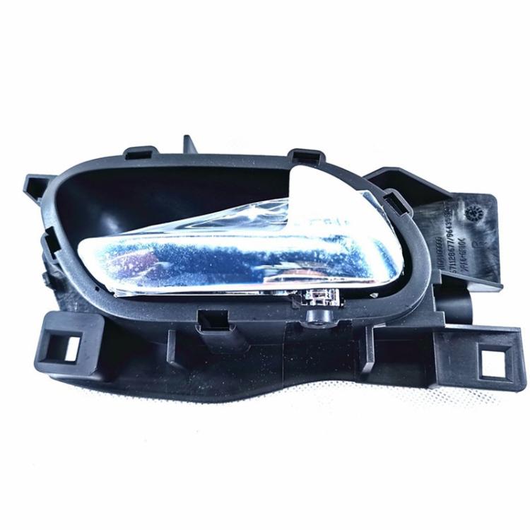 Car interior door handle assembly with black frame and chrome insert lens
