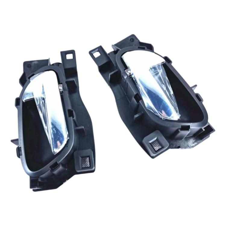 Pair of car interior door handles with black housing and chrome inserts