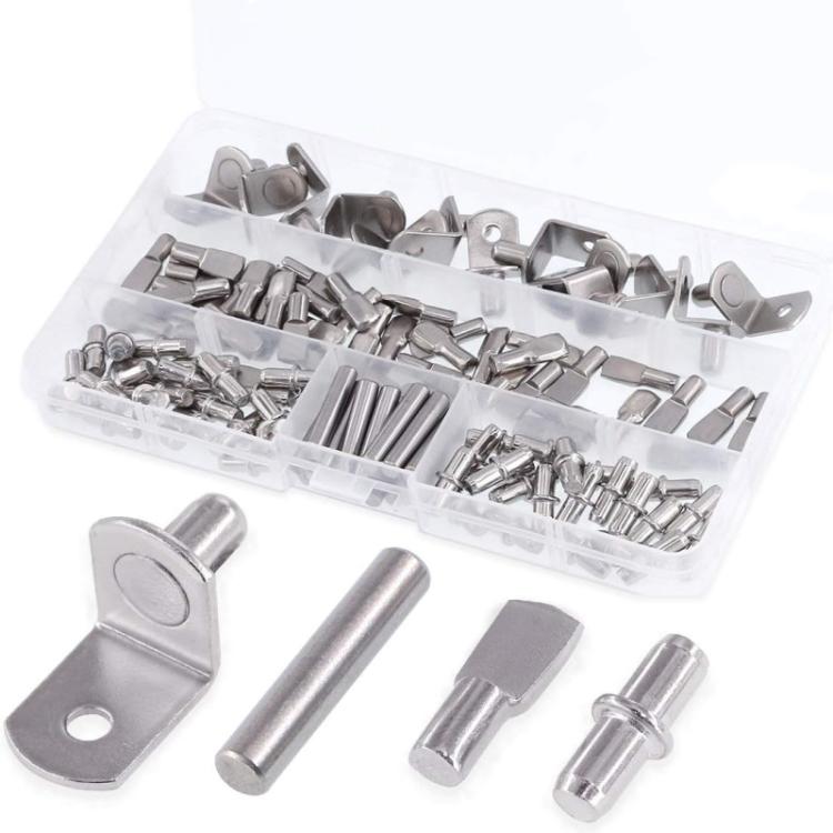 Metal shelf support pegs kit with assorted brackets and pins in clear plastic tray
