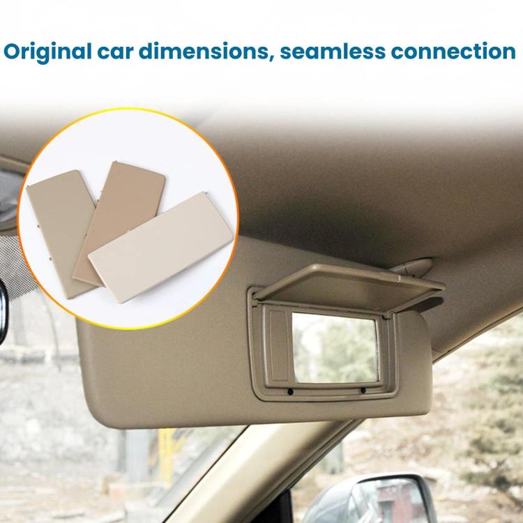 Beige sun visor vanity mirror cover installed on car, rectangular frame