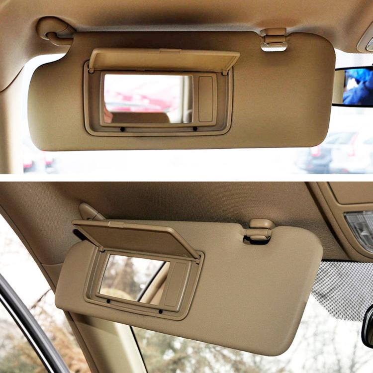 Beige sun visor vanity mirror cover installed on car, showing mirror opening