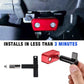 OBD port lock installed on vehicle dashboard area, red cover with two metal screws.