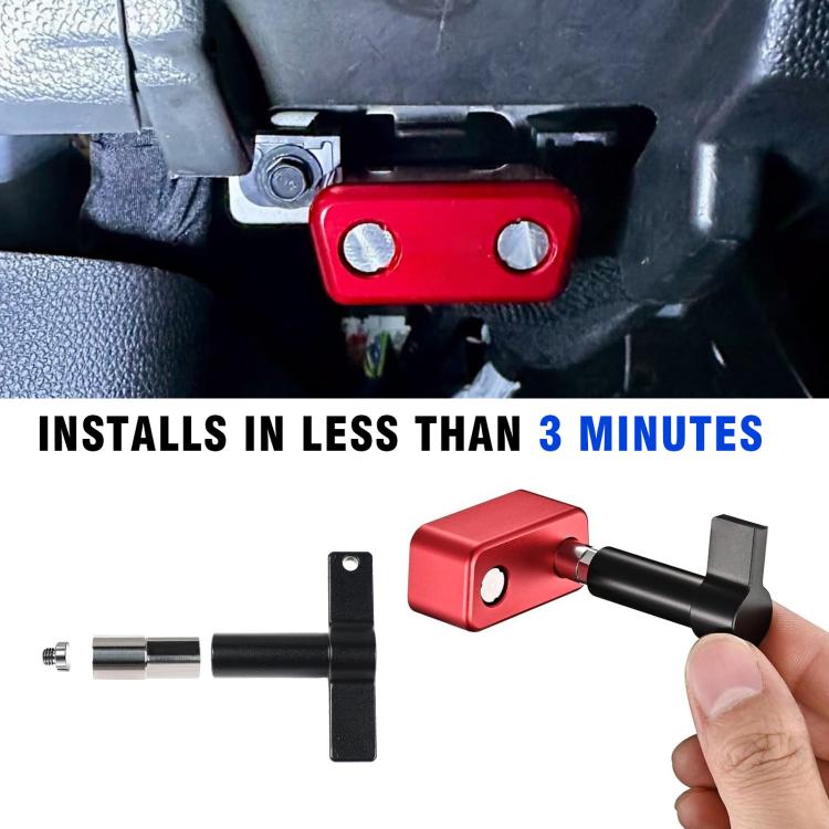 OBD port lock installed on vehicle dashboard area, red cover with two metal screws.